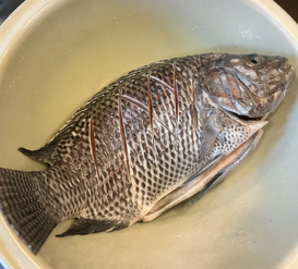 Rub the tilapia with salt on both sides and let it sit for a few minutes while you prepare the other ingredients.