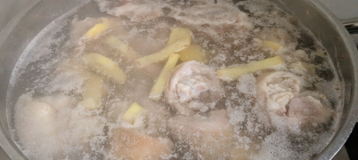 In a pressure cooker or large pot, add 8 cups water, ginger, salt, and the cleaned meat. Pressure cook for 45 to 60 minutes, or simmer in a regular pot for about 2 hours until tender.