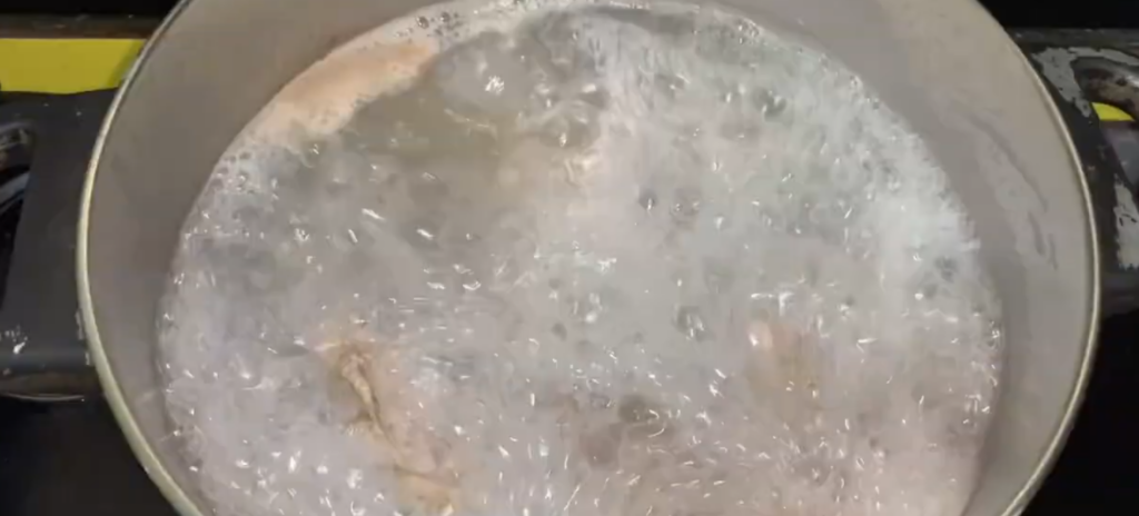 Add the goat meat and simmer until tender. This may take 45 minutes to 1 hour, depending on the meat.