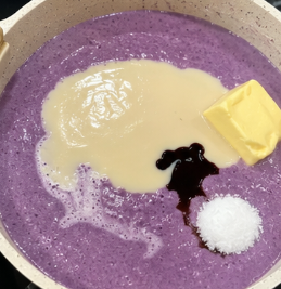 Add the condensed milk, butter, ube extract, and salt. Stir everything together until combined.