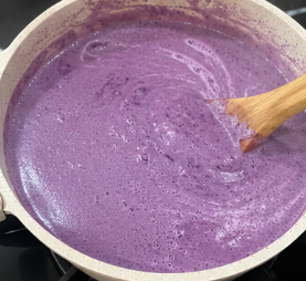 Turn the heat to medium-low and cook the mixture while stirring often. Scrape the bottom and sides of the pan to prevent burning.