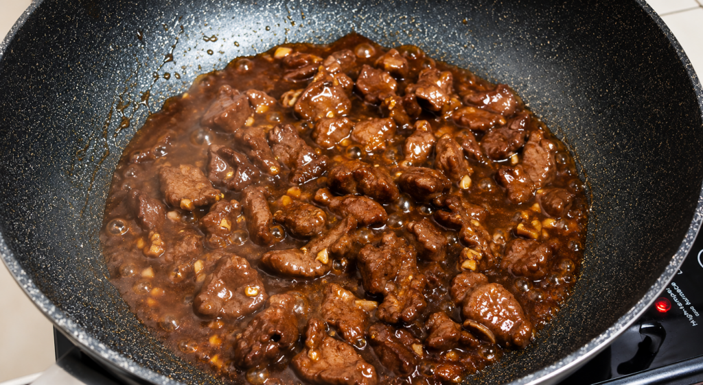 Pour in the water and bring to a boil. Lower the heat and simmer for 30 to 40 minutes or until the beef becomes tender.