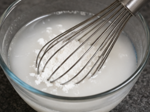 In a small bowl, combine the reserved vegetable juices and cornstarch. Mix until smooth to make a slurry.