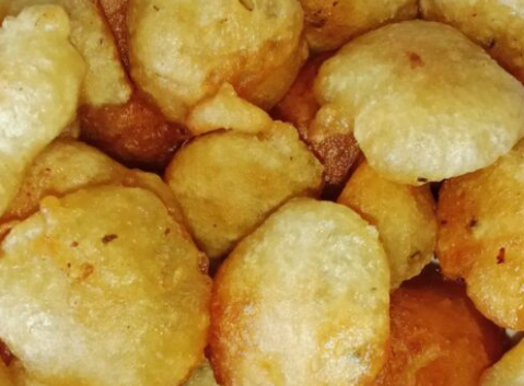 Let the fish balls cool slightly, then deep-fry them in hot oil until lightly golden. Serve with your favorite fish ball sauce.