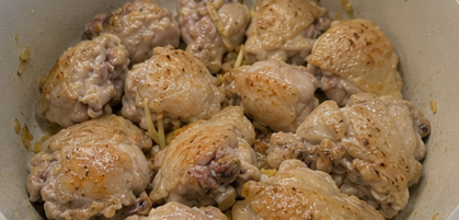 Add the chicken pieces and cook until lightly browned on all sides.