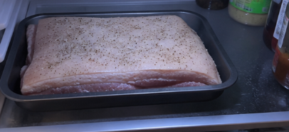 Place the pork on a plate or tray with the skin facing up. Refrigerate uncovered overnight so the skin dries out, which helps create an extra crispy crackling.