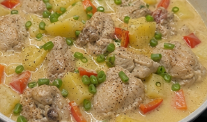 Season with salt and black pepper. Garnish with sliced green onions and serve hot with steamed rice.