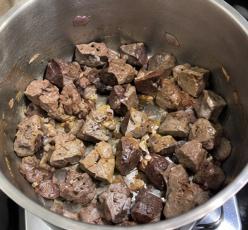 Add the cubed beef heart and kidney. Sauté until the outside of the meat turns lightly brown.
