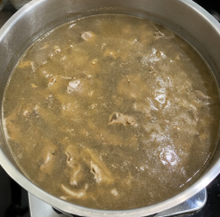 Pour in 8 cups of water and bring it to a boil. Reduce the heat and gently simmer until the heart, kidney, tripe, and intestines are tender.